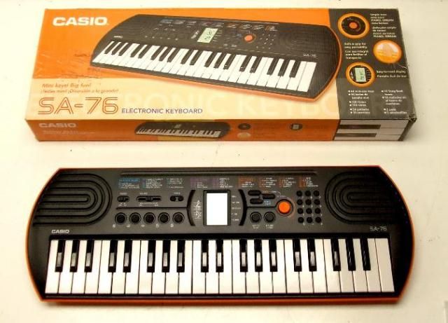Casio SA 76 44 Key Mini Electronic Keyboard w Tempo Control Orange 