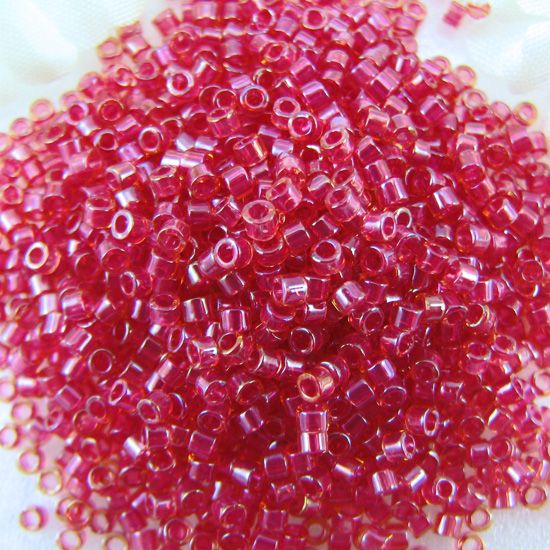 Miyuki delica seed beads 11/0 lt cranberry lined topaz J12079
