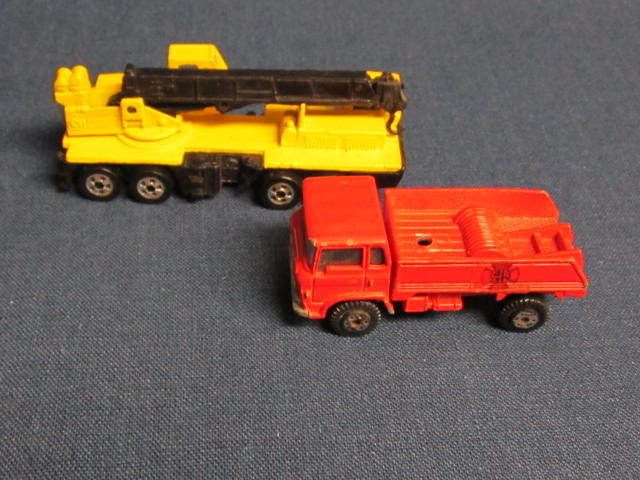   Die cut toy red truck made in Hong Kong by yatming crane Mattel 1987